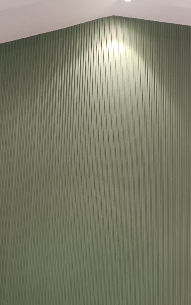Sage green fluted wall panel feature wall installation in Mumbai