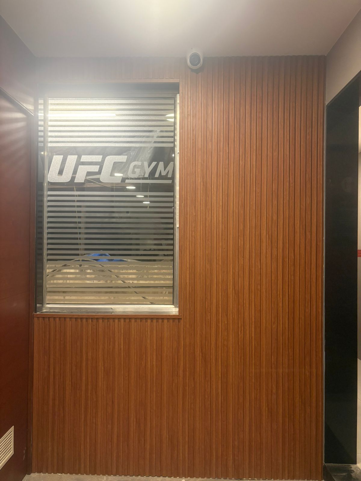 Wudonn D-2 fluted wall panels installed at UFC Gym, Mumbai