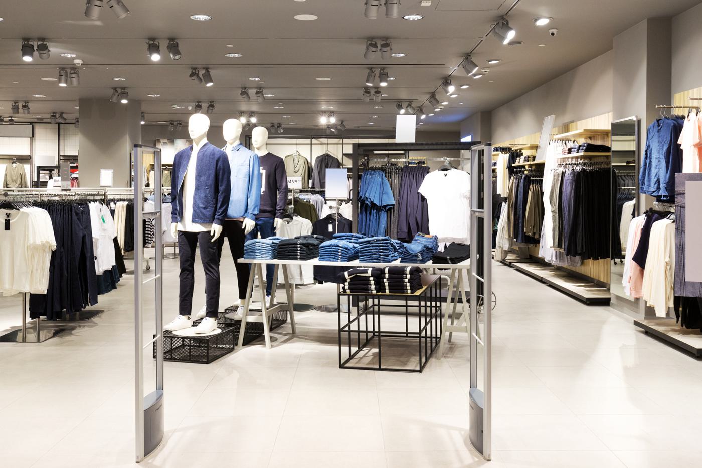 Fashion store interior with mannequins and wall displays