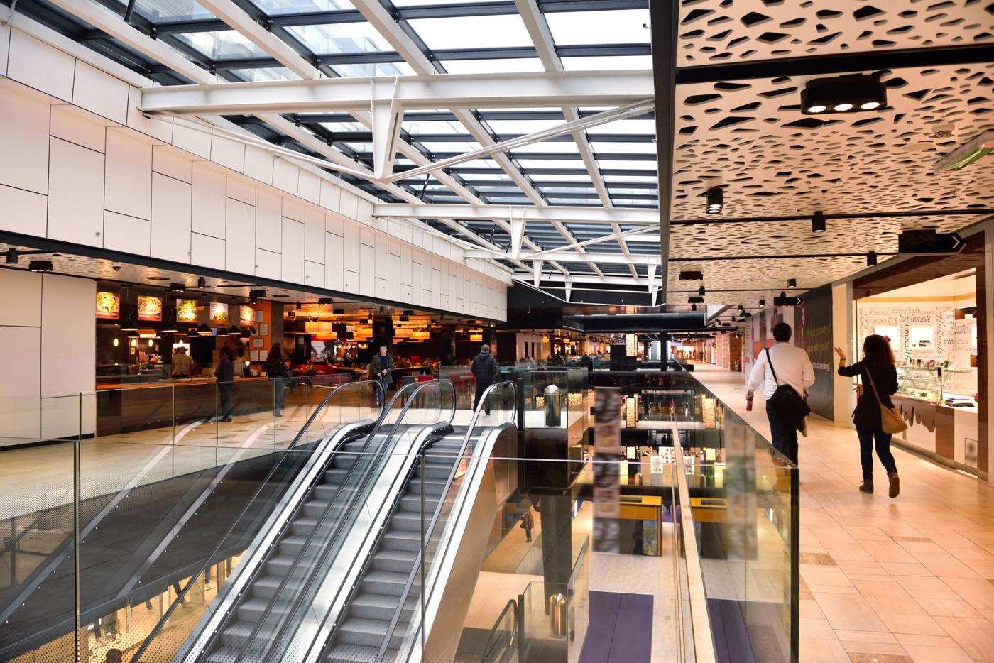 Shopping mall atrium with shopfronts on two levels