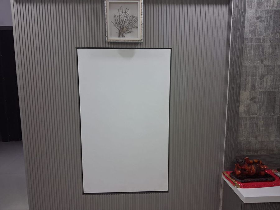 Grey fluted WPC wall panels installed on a feature wall