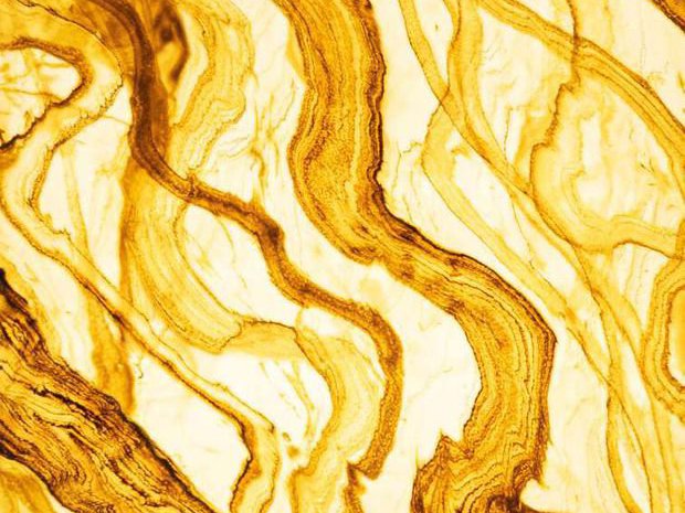 Amber Dorata alabaster sheet glowing when lit from behind
