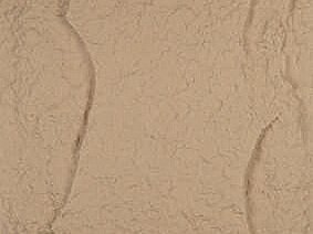 Sand-coloured PU stone panel with a split-rock relief