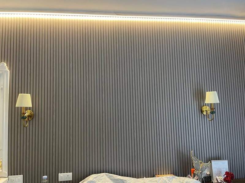 Bedroom wall after Urbane Decor panel installation